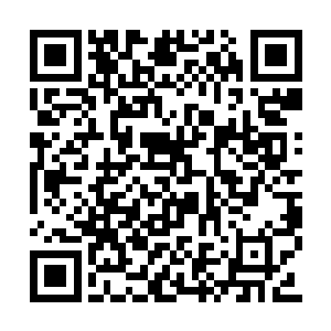 我直接催动异能在这个城市中锁定了王勇的位置二维码生成