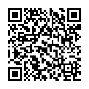 战傅羽被半个身子的巨大战神能量身影包裹在其内二维码生成