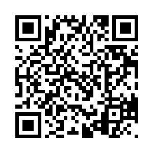 战神能量体手中蓦然出现一把模糊不清二维码生成