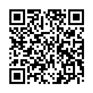 手上的包是她从北京带来的众多的包之一二维码生成