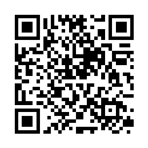 手中握着一柄巨斧正在抵挡着三头冰猿的攻击二维码生成