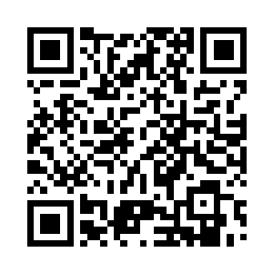 手臂之上竟然刺着一个威武不凡的龙头二维码生成