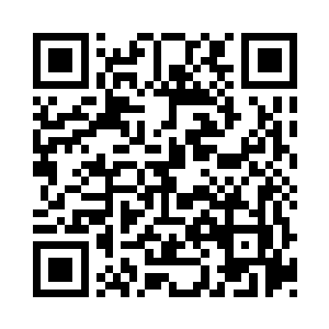 把手里的一张名片放在了马萨尔的办公桌上二维码生成