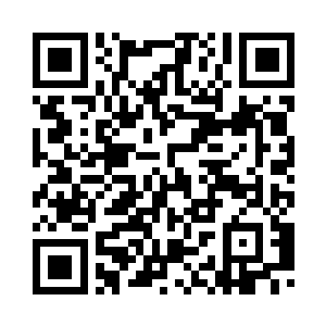 把杯子放在了沙发前面的小茶几上二维码生成