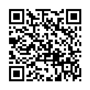 抓在了默罕默德拿着刀柄的手腕上二维码生成