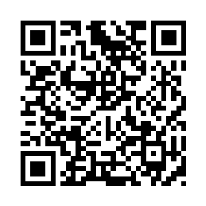 抡起骨刺狠狠地砸向三根黑乎乎的筒状物二维码生成