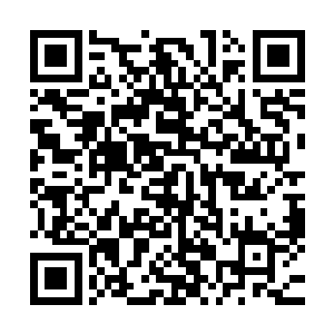 披散的长发出色的面容即便五十多了看上去跟三十多相差无几二维码生成