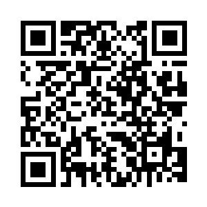 抱着笔记本电脑坐在沙发玩着游戏二维码生成
