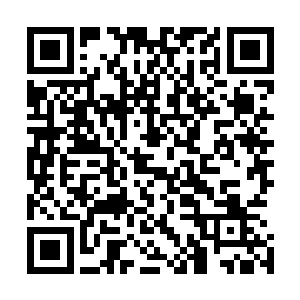 拉了拉头上的黑色头巾说明黛茜还是保持了她的伊斯兰信仰二维码生成