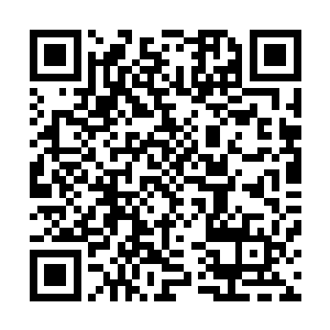 拉着风含笑便向距离坑洞十几丈外的一块黑色的石头旁走去二维码生成