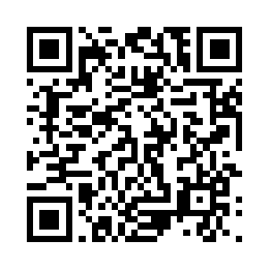 拍卖会的建筑外墙上也会同步直播拍卖的画面二维码生成