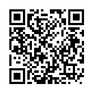 拿起遥控器打开电视机换到了nbc电视台二维码生成