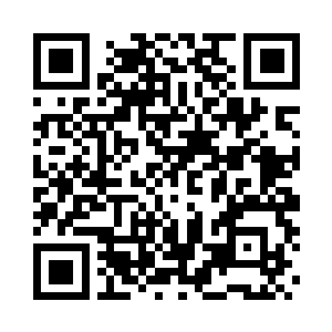 振兴医院正门的马路对面是一家上下三层二维码生成