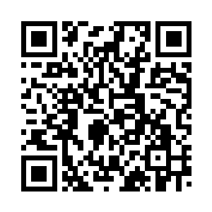 推着一张类似牙科手术床般的铁椅二维码生成