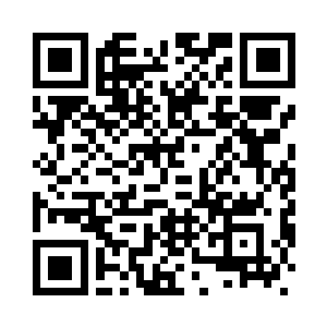 提起桌面上的茶壶给自己满了一杯二维码生成