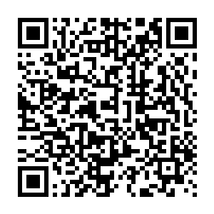 摩托车和行人已经让昔日相当僻静的公园路变成了相当繁盛的闹市区二维码生成