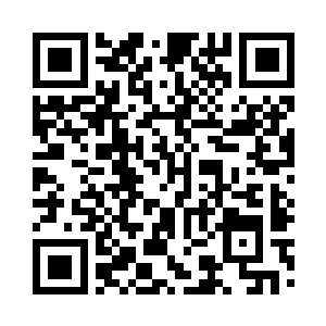 撞断后面的石柱子贴在墙壁上才停了下来二维码生成