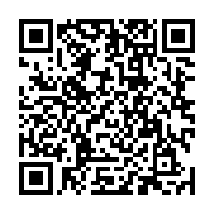 撞针在弹簧力作用下迅速向前运动进入保险槽内的机械声二维码生成