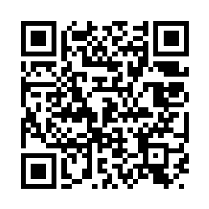 教授的电脑桌和学生们的在一个办公室里二维码生成