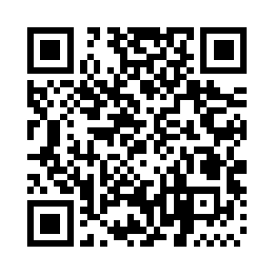 数千穿着太夏军服的人在圆盘之中忙碌着二维码生成