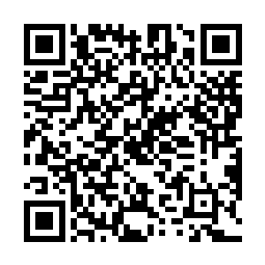 整个人犹如一块没有任何生命气息的冰冷的黑色花岗岩二维码生成