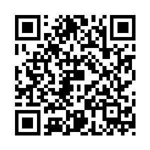 旁边运转不休的运输带末尾则是体格巨大二维码生成