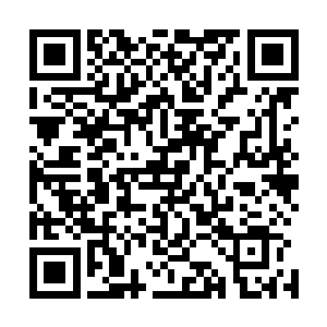时空中本来就扭曲的光线在这个更加强烈的扭曲中消失不见二维码生成