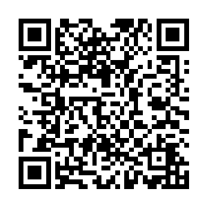 明显稀少许多的灯光和个别路边房屋里摇曳的烛光油灯二维码生成