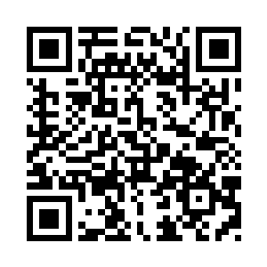 是一个和之前一模一样的黑乎乎石头蛋二维码生成