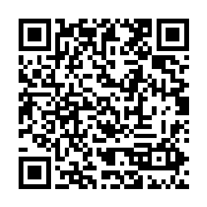 是1955年由七十几名知识青年来到这座荒山秃岭建设而成二维码生成