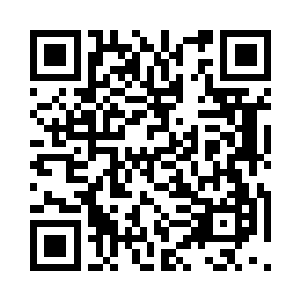 暗红色的血迹中躺着一本有些破旧的书籍二维码生成