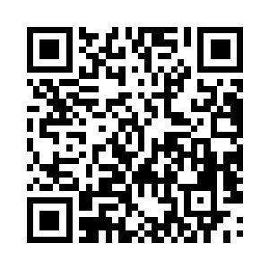 曲歌正坐在我的位置上虎视眈眈地看着我二维码生成