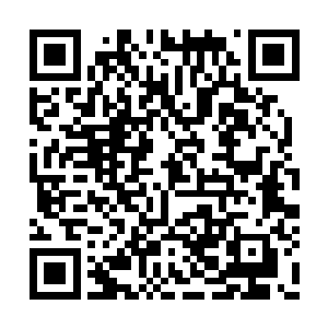 期间夹杂着的白色花纹构成而来一张凄厉的哭脸二维码生成