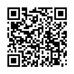 朱国旭放下了手里关于雁湖村奇石展的介绍二维码生成