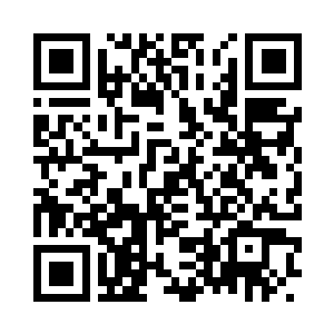 李毅正在办公室里思考工作上的事情二维码生成