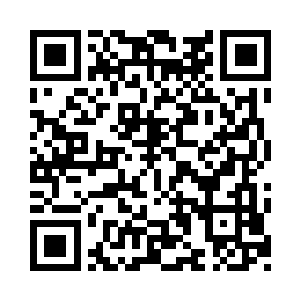 李谦和谭德章两个人就在李谦的办公室里二维码生成