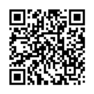 李谦正在自己的办公室里看投稿来的歌本二维码生成