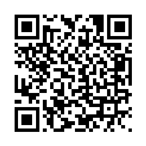 李金方一个人在四楼通往楼顶的楼梯口掩护二维码生成