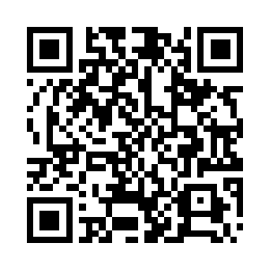 杨水娇指向门口靠墙位置的一张展台二维码生成