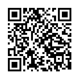 杨辰轻松地走到摆放真皮沙发的休息区二维码生成