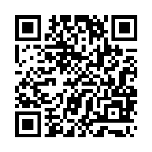 林锐等人坐在货车的后面一边开枪压制住追击二维码生成