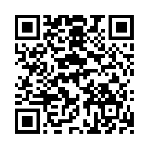 梳着标志性背头的沈楠朋是沪市交大85级本科生二维码生成