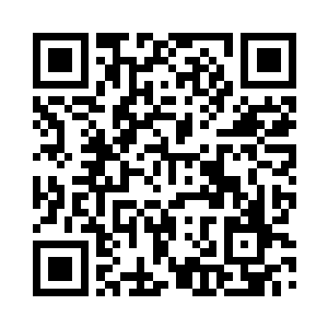 楚门坐在帆船之上露出了灿烂的笑容二维码生成