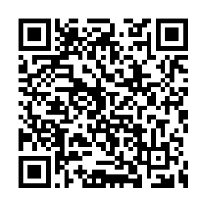 欧阳志远和黄晓丽那天看到三检商贸大楼的时候二维码生成