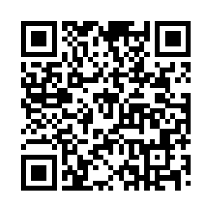 正在厨房炒菜的王淑芳正好端出一个菜来二维码生成