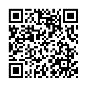 正好落在了中间媒体席一个蓝衣女记者的头上二维码生成