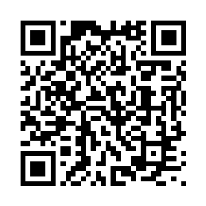 正对着大堂上摆着的一个灵位念经二维码生成