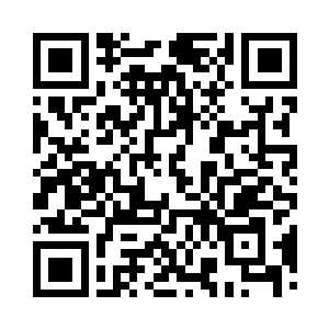 正是挥舞着手中笔记本的班主任老师徐敏静二维码生成