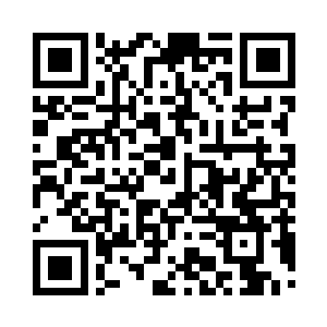 此时一个漂亮护士模样的女子从门里出来二维码生成