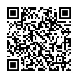 此时四处汹涌而来的洪水已经达到了水库的最大峰值了二维码生成